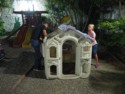 Matt and Cora repairing the play house